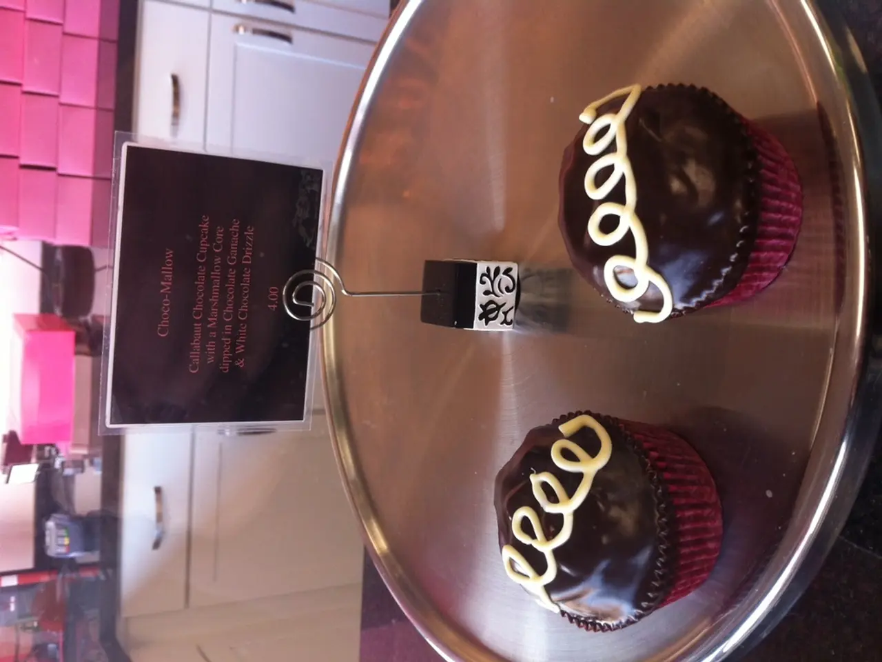 In this rotated image there is a wooden table to the right. On the table there is a plate. There...