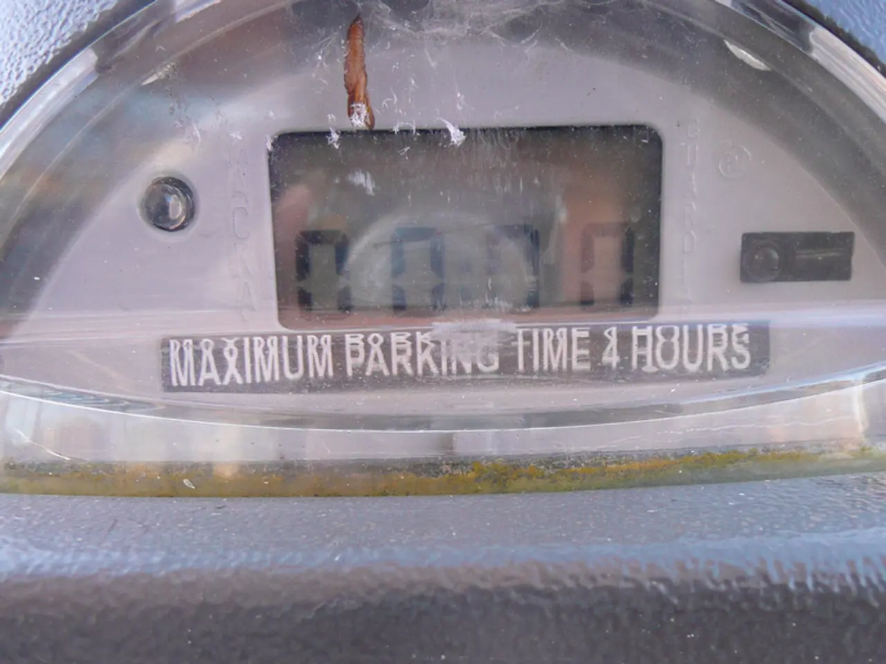 In the image we can see there is a meter on which it's marked as zero zero four zeros. On its...