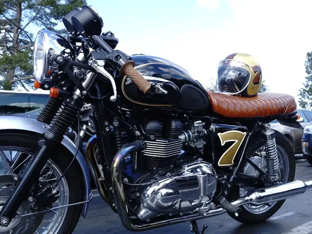 In the center of the image there is bike with a helmet on it. In the background of the image there...