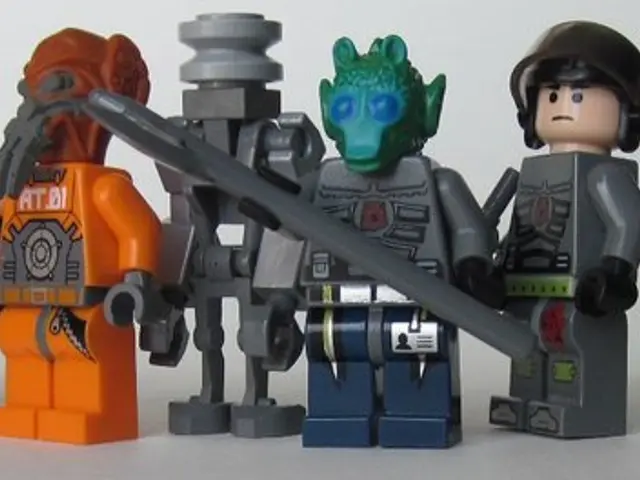 In this picture we can see many toys. In the center there is a robot. Here we can see another toy...